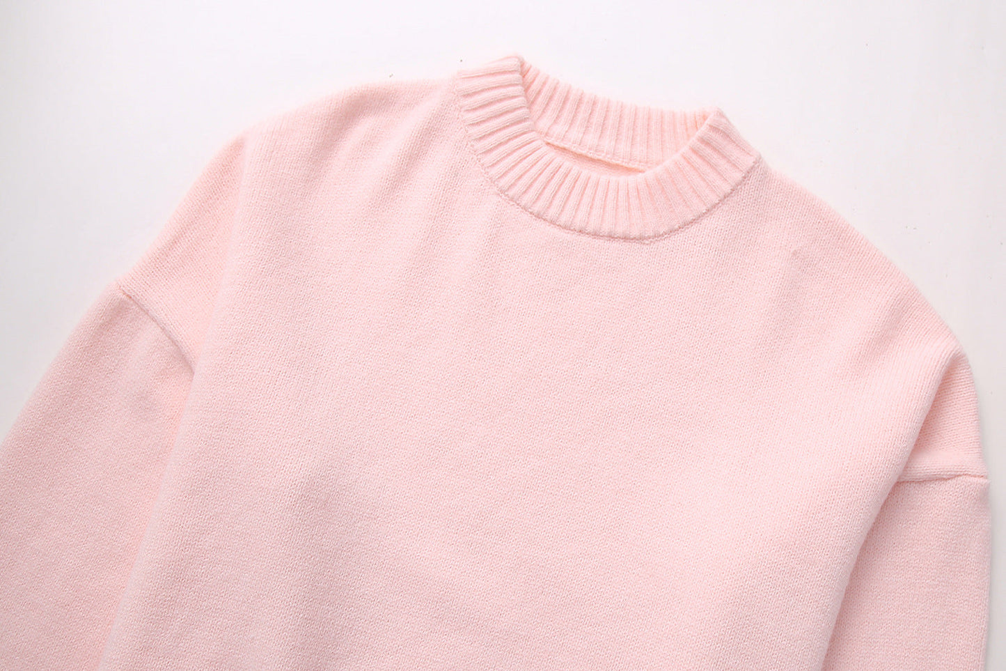 Anmutig gestaltete Pullover