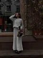 Anmutig gestaltete Pullover