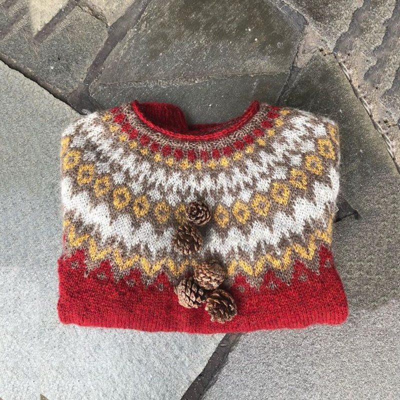 Anmutig gestaltete Pullover