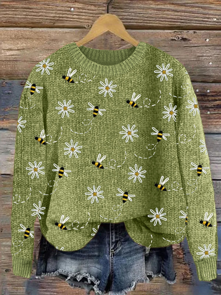 Strickpullover mit Gänseblümchen- und Bienenstickerei