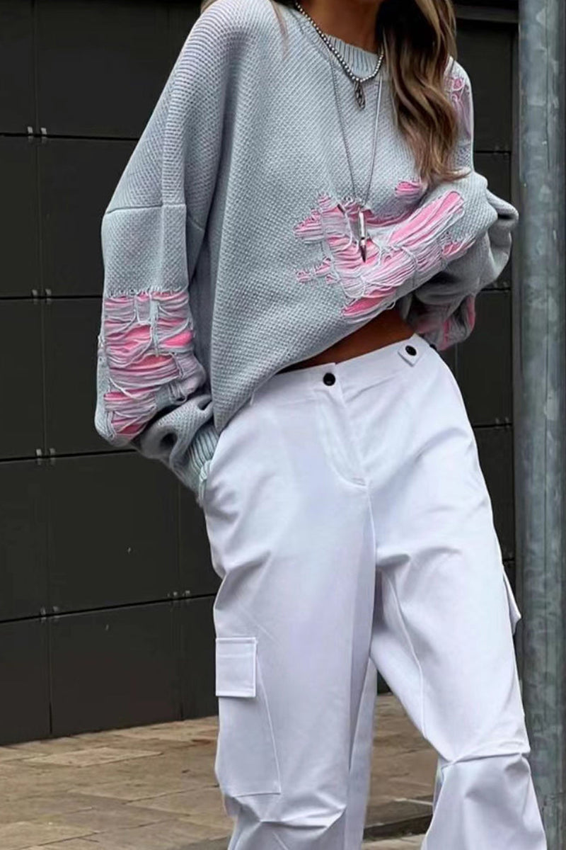 Anmutig gestaltete Pullover