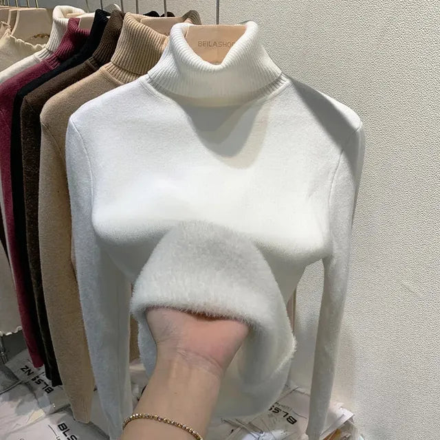 Anmutig gestaltete Pullover