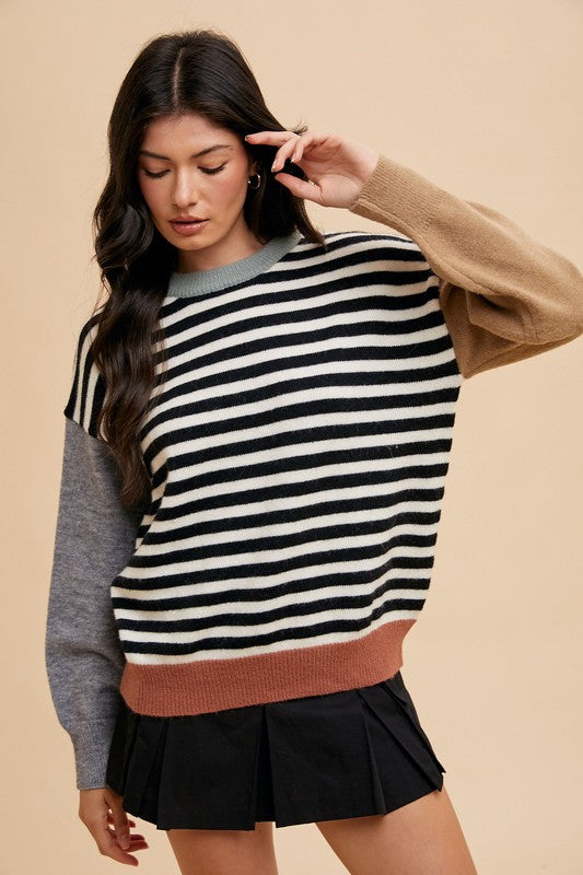 Anmutig gestaltete Pullover