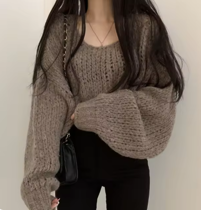 Anmutig gestaltete Pullover