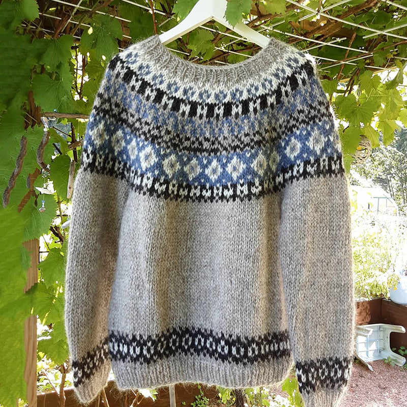 Anmutig gestaltete Pullover