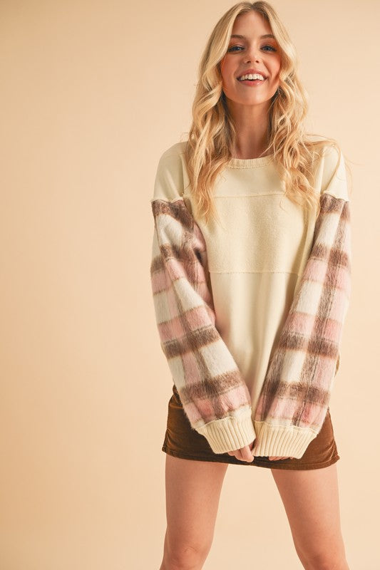 Anmutig gestaltete Pullover