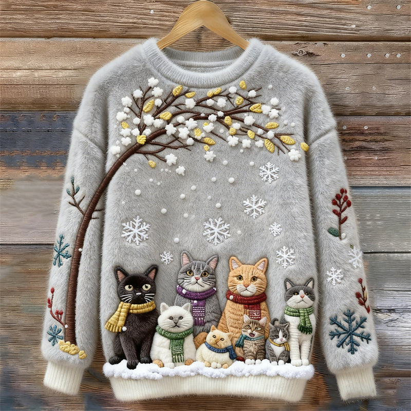 Baumwollpullover mit Katzen unter verschneitem Baum mit Schals