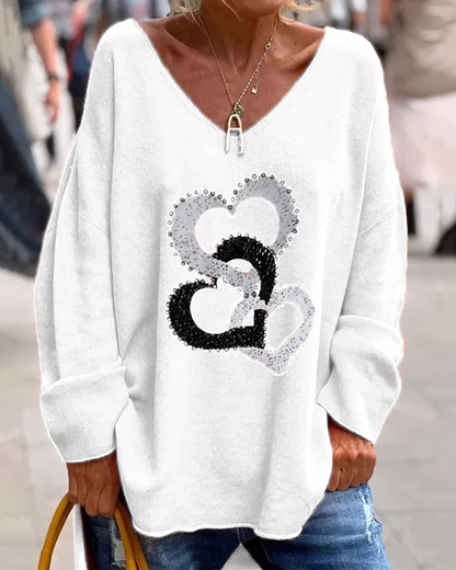 Anmutig gestaltete Pullover