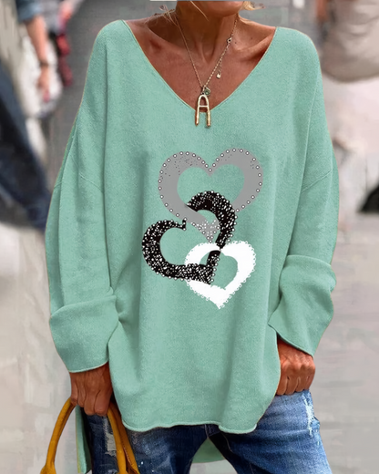 Anmutig gestaltete Pullover