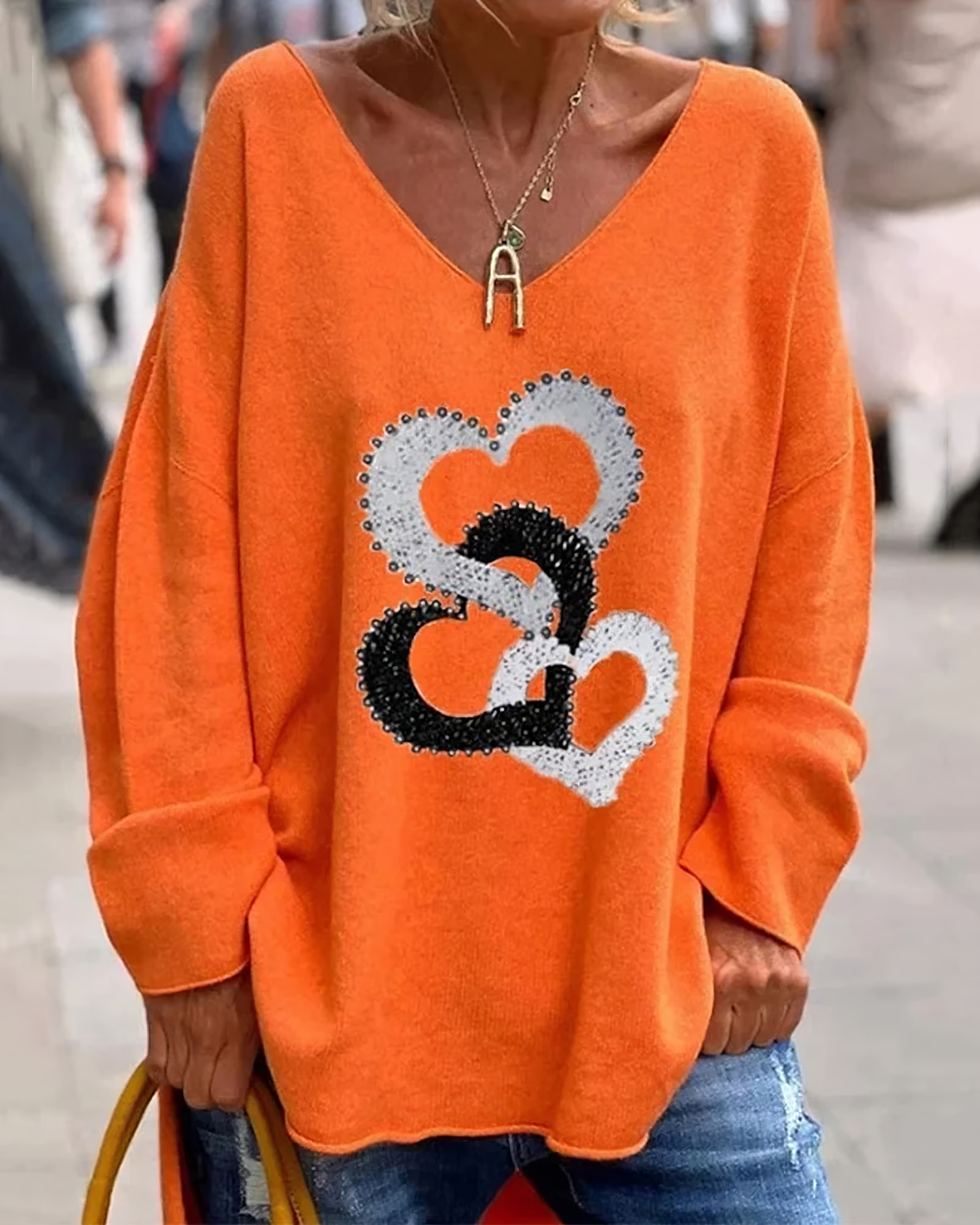 Anmutig gestaltete Pullover