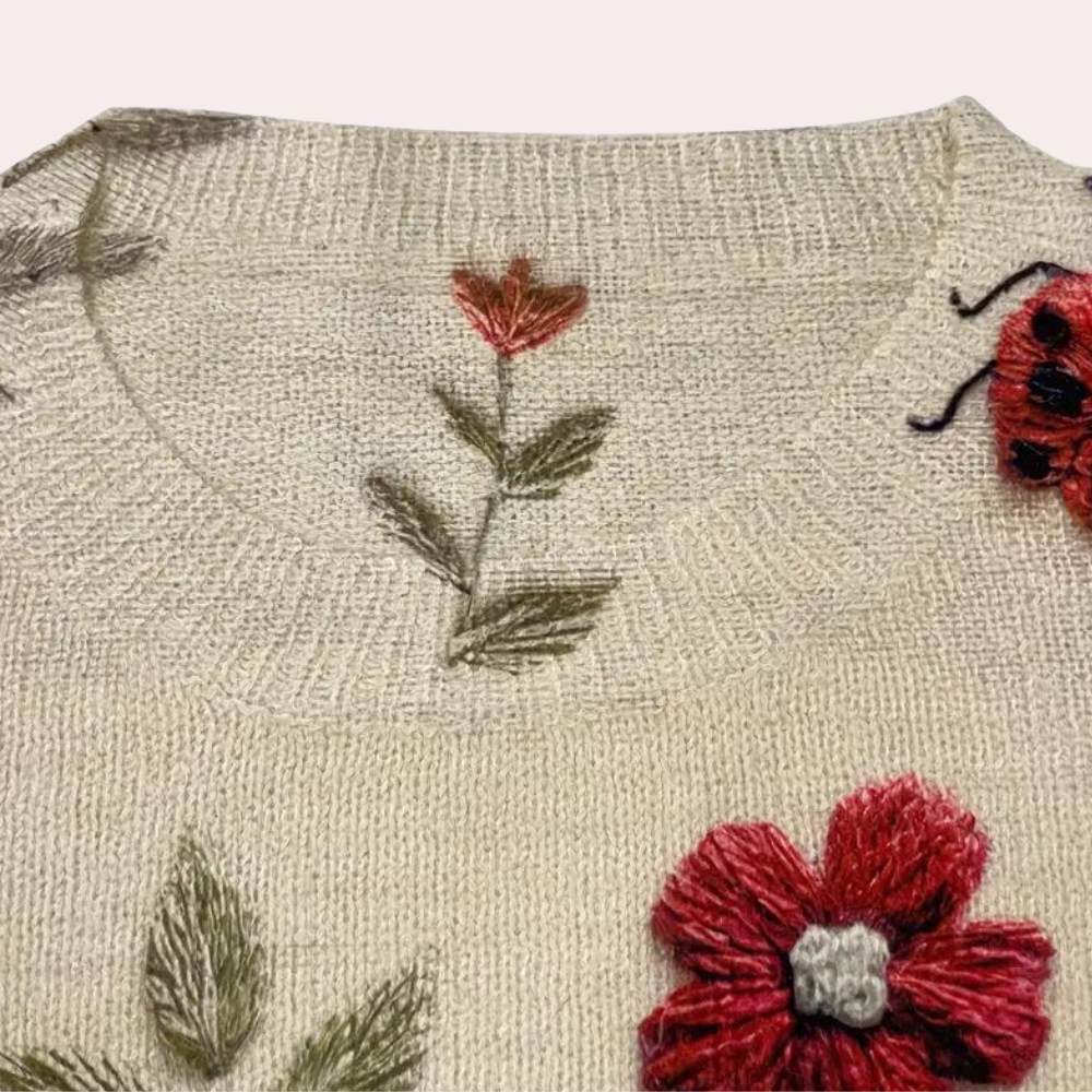 Baumwollpullover mit mehrfarbigen gestrickten Insekten und Blumen