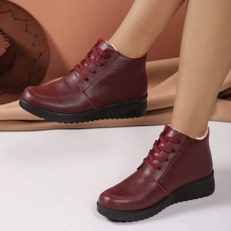 Stützende und trendige orthopädische Stiefel