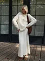 Anmutig gestaltete Pullover