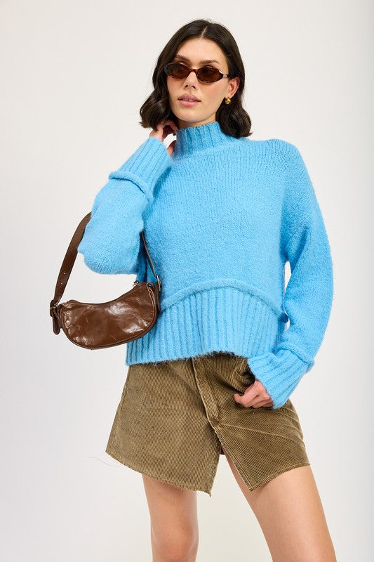 Anmutig gestaltete Pullover