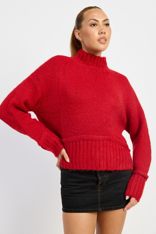 Anmutig gestaltete Pullover