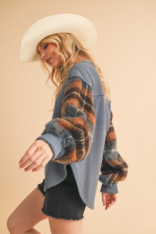 Anmutig gestaltete Pullover
