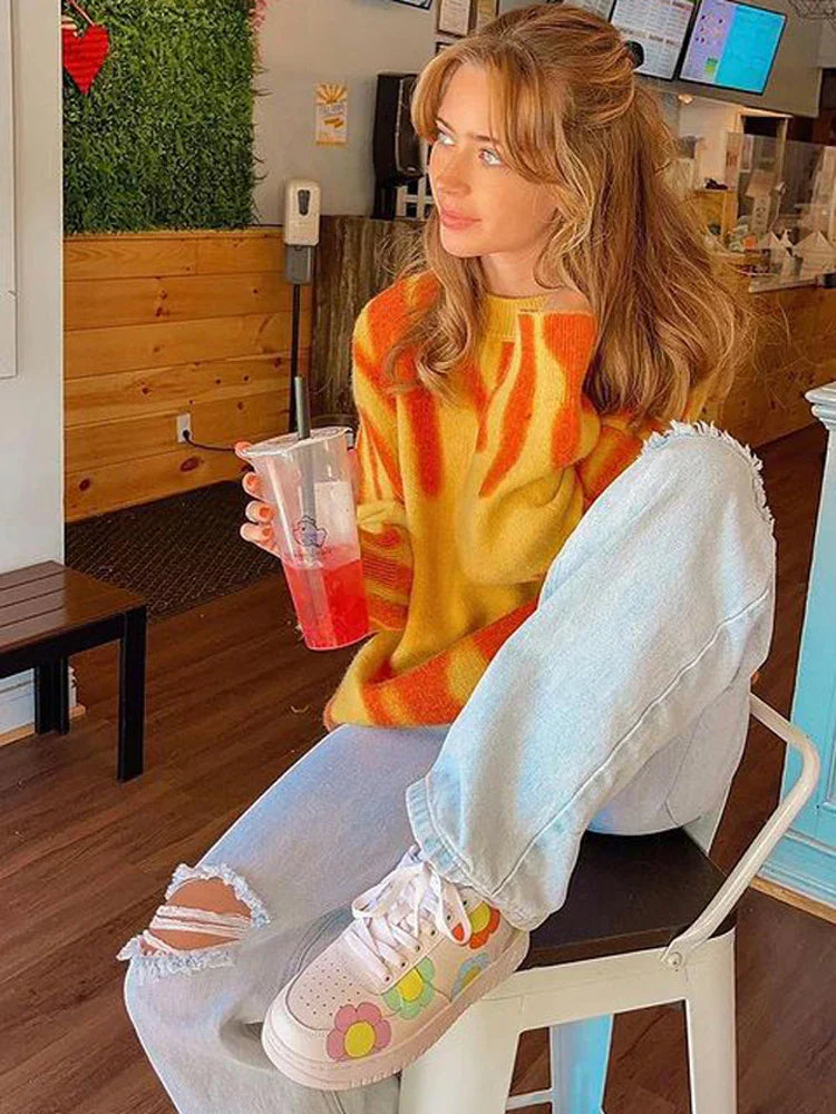 Anmutig gestaltete Pullover