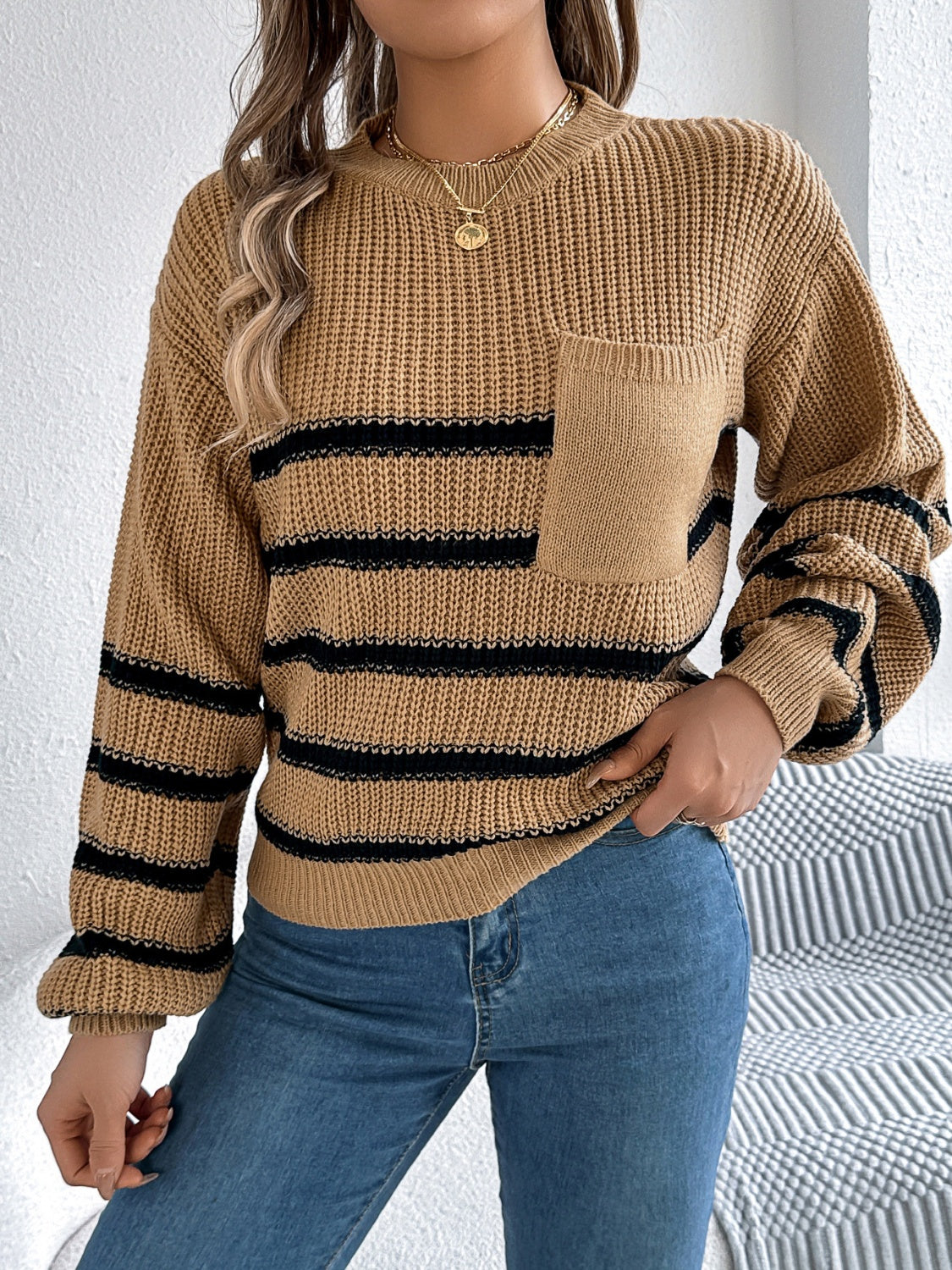 Anmutig gestaltete Pullover