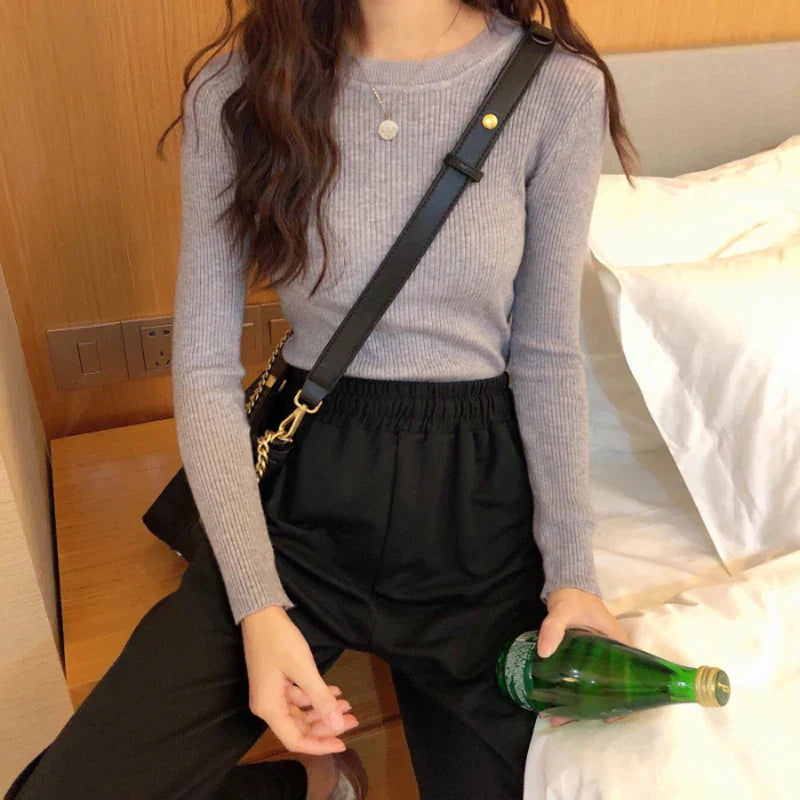 Anmutig gestaltete Pullover
