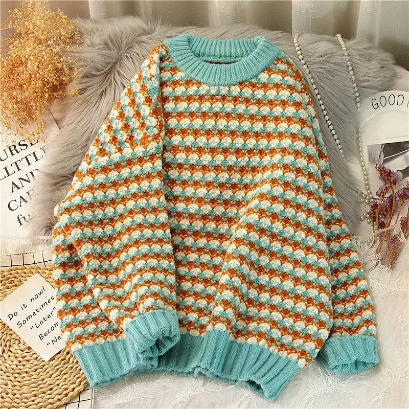 Anmutig gestaltete Pullover